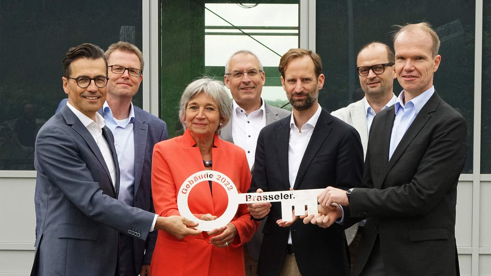 Handing over the key to the new building